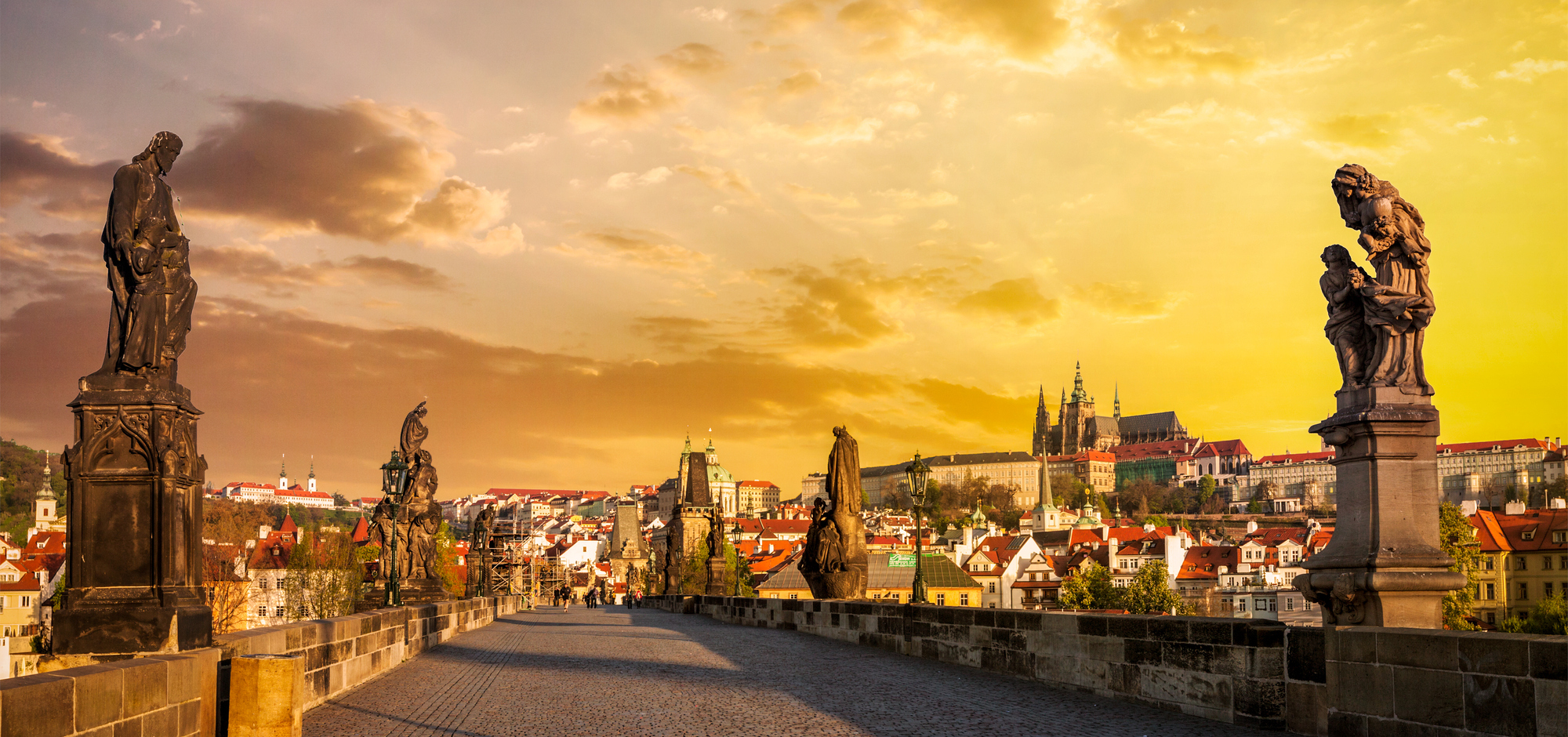 Charles bridge and Prague castle in the early morning on sunrise. Prague, Czech Republic